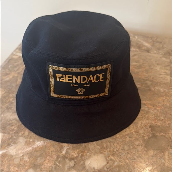 FENDI x VERSACE “FENDACE” Black and Gold Canvas Logo Bucket Hat