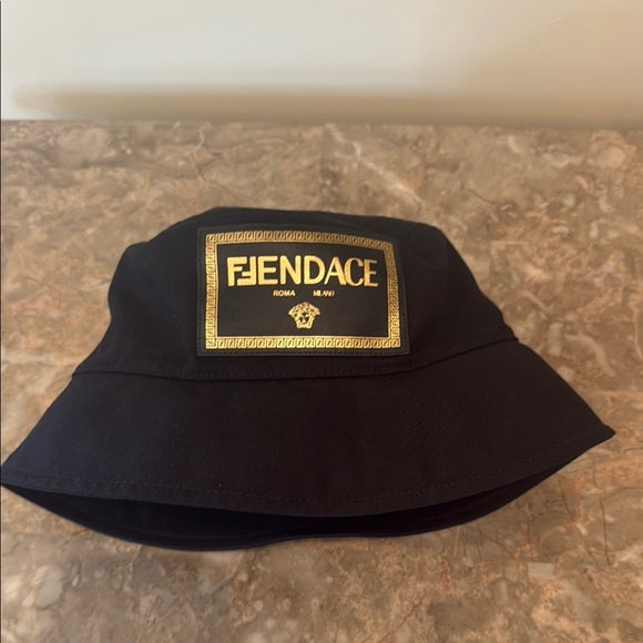 FENDI x VERSACE “FENDACE” Black and Gold Canvas Logo Bucket Hat